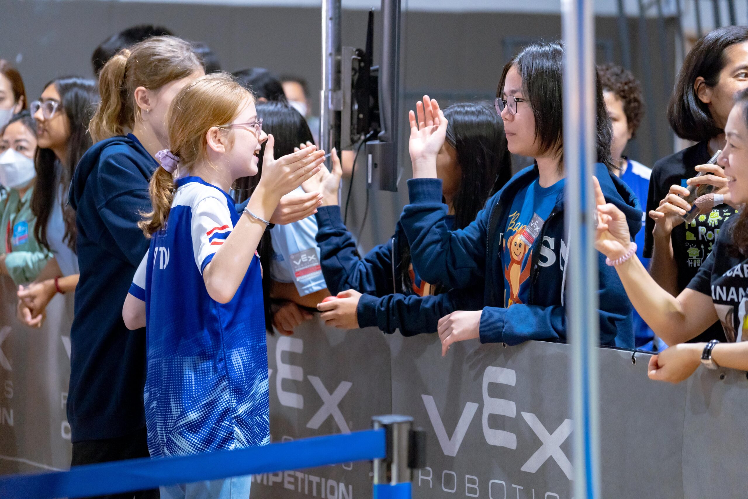 Team mates shaking hands and encouraging each other for the competition