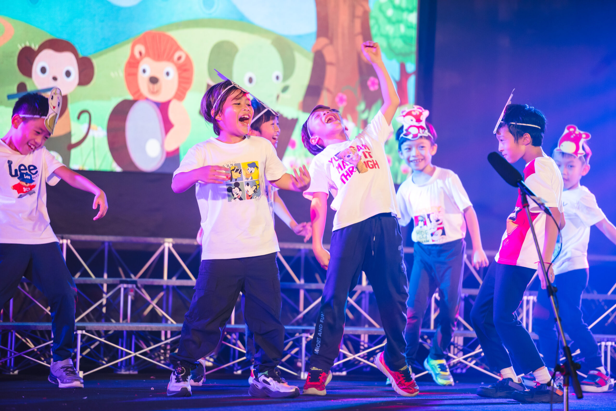 Energetic kids performing on stage