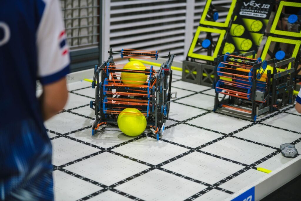 A robot collecting two balls in a robotics match