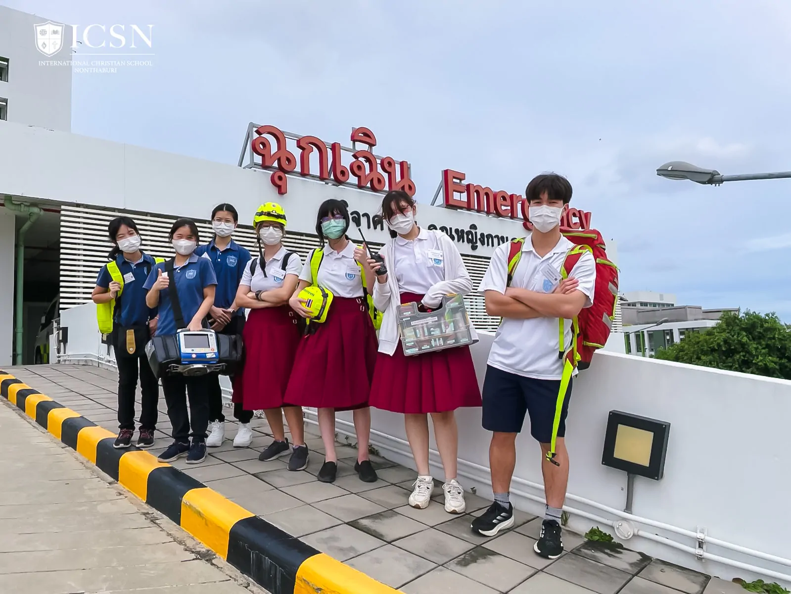 Student interns at an emergency entrance