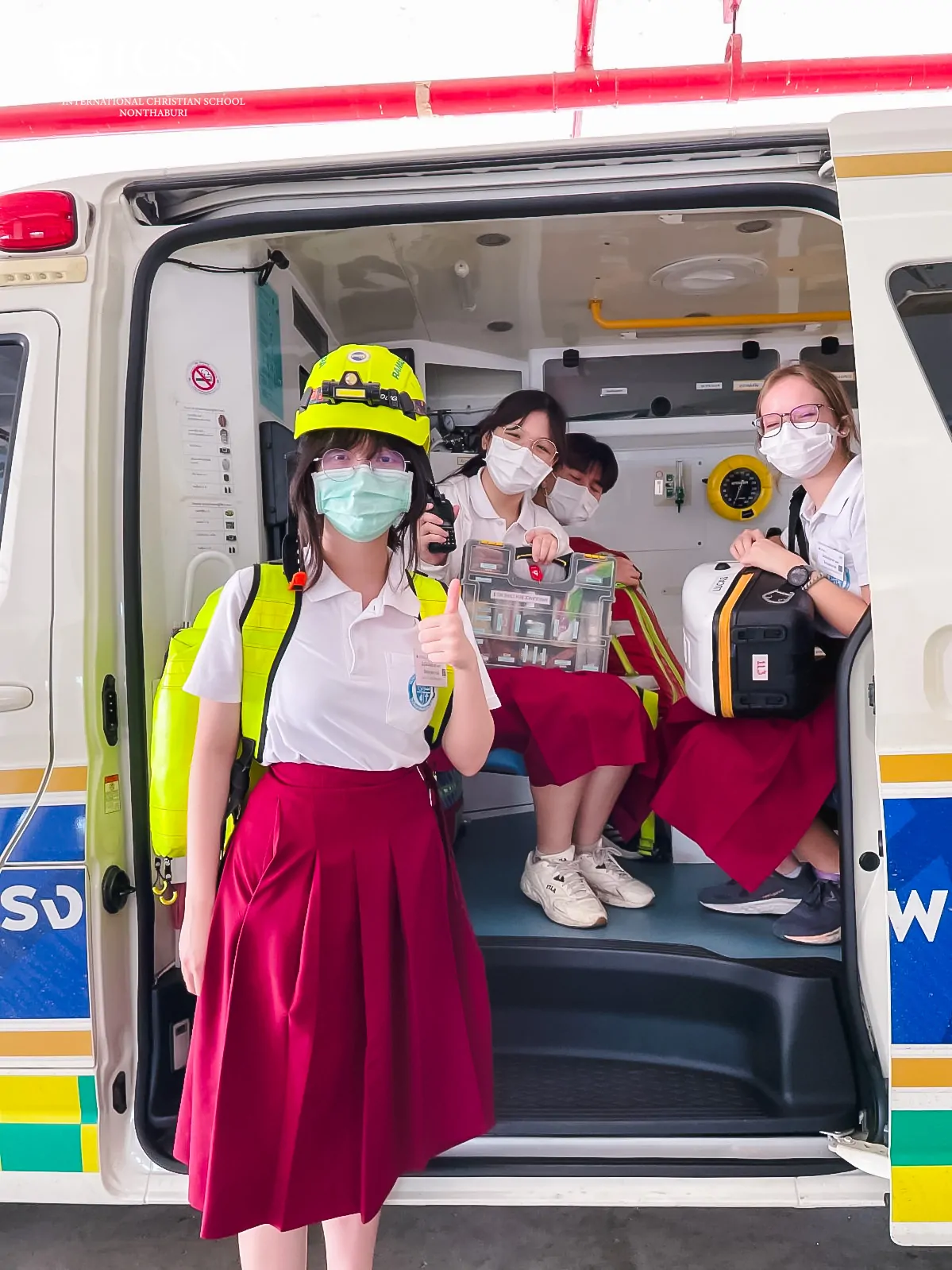 Student interns in an ambulance